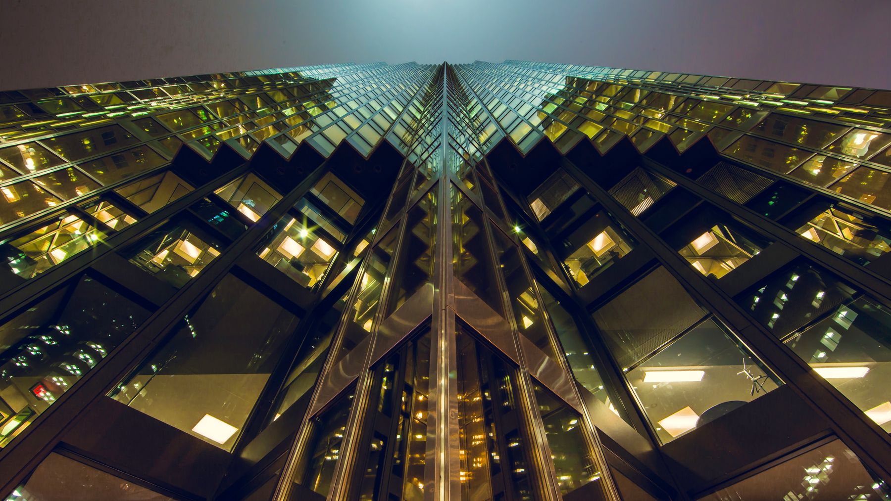 Glass facade rising toward the sky
